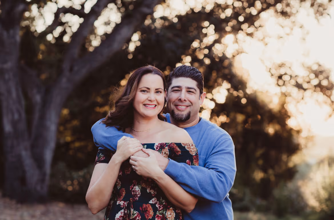 Alisa and her husband outside 