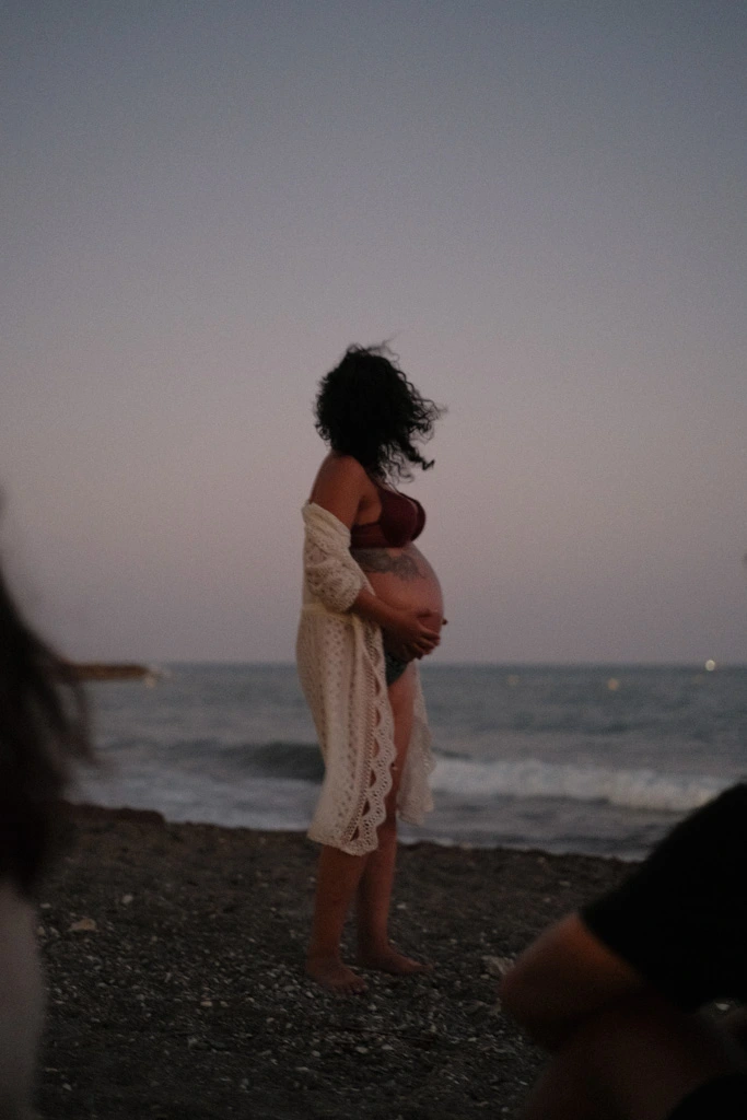 A pregnant women at sunset in Malaga