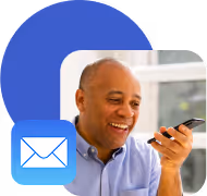 Man is holding his phone and talking into it.