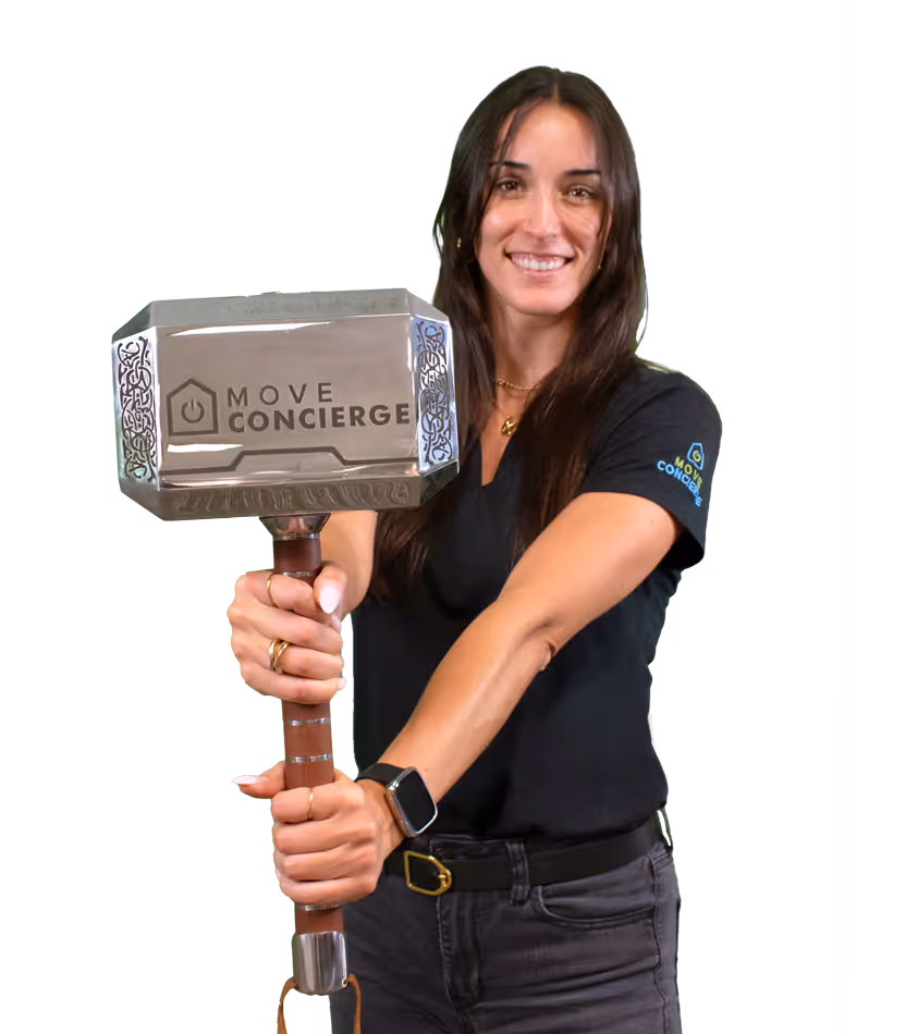 Kayla Damm holding the building a positive culture core value award.