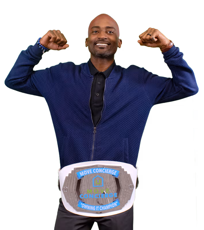 Jay Wright holding the owning it core value award.