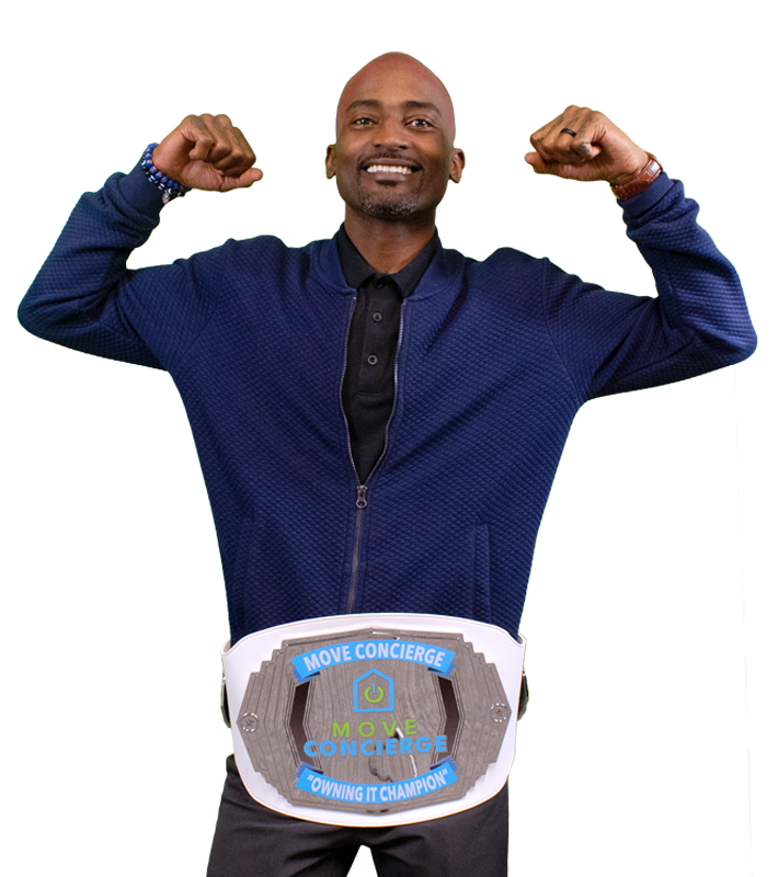 Jay Wright holding the owning it core value award. 