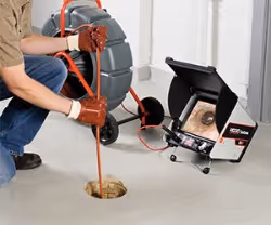 Sewer camera inspection with on-screen measurements and footage