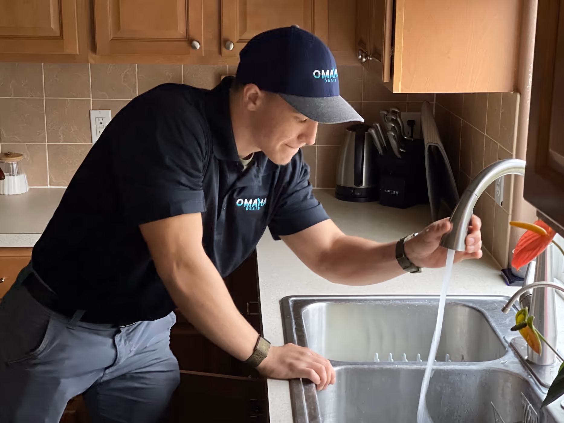 Omaha Drain technicians standing in front of service truck