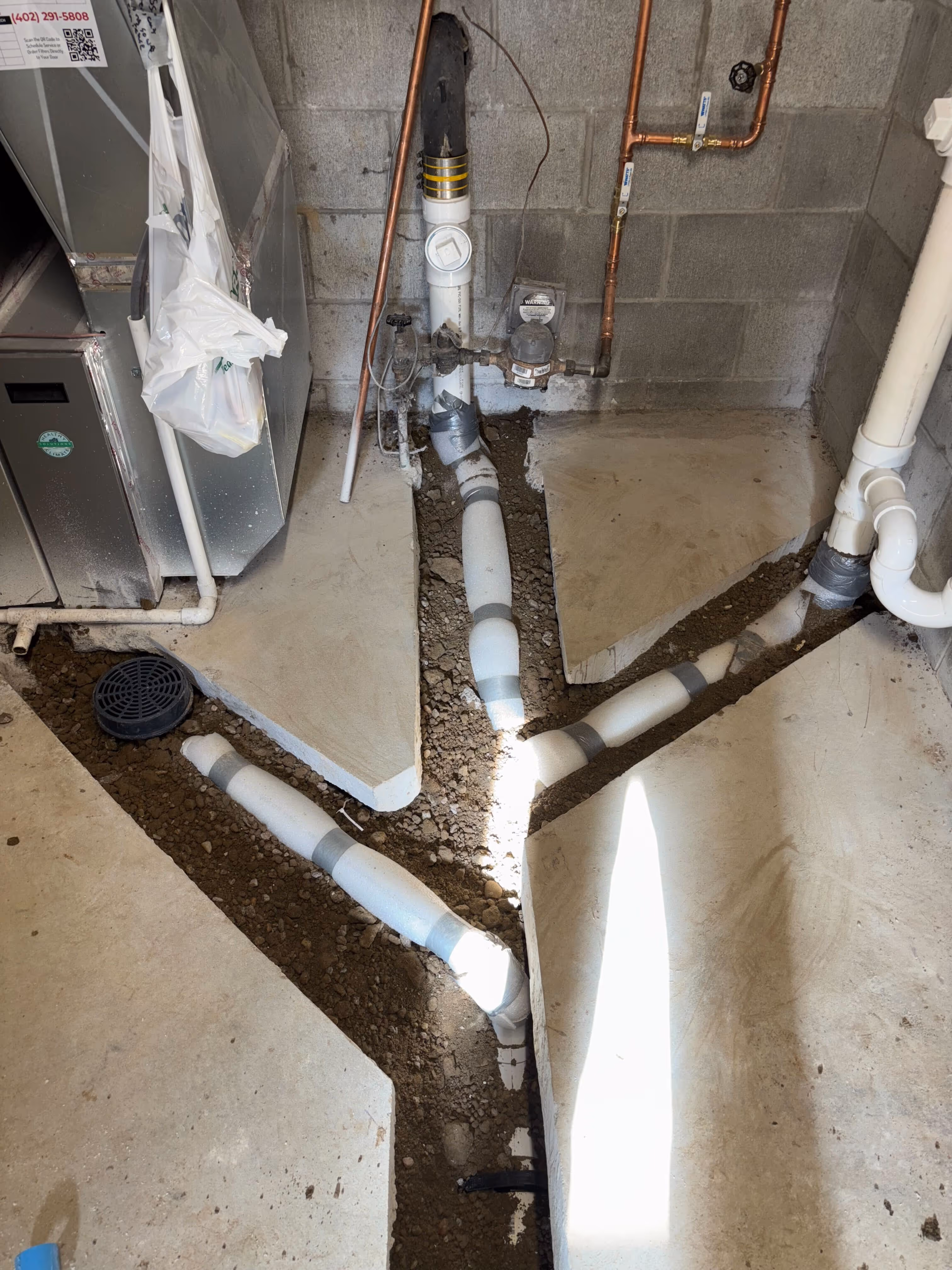 Basement floor opened for sewer replacement