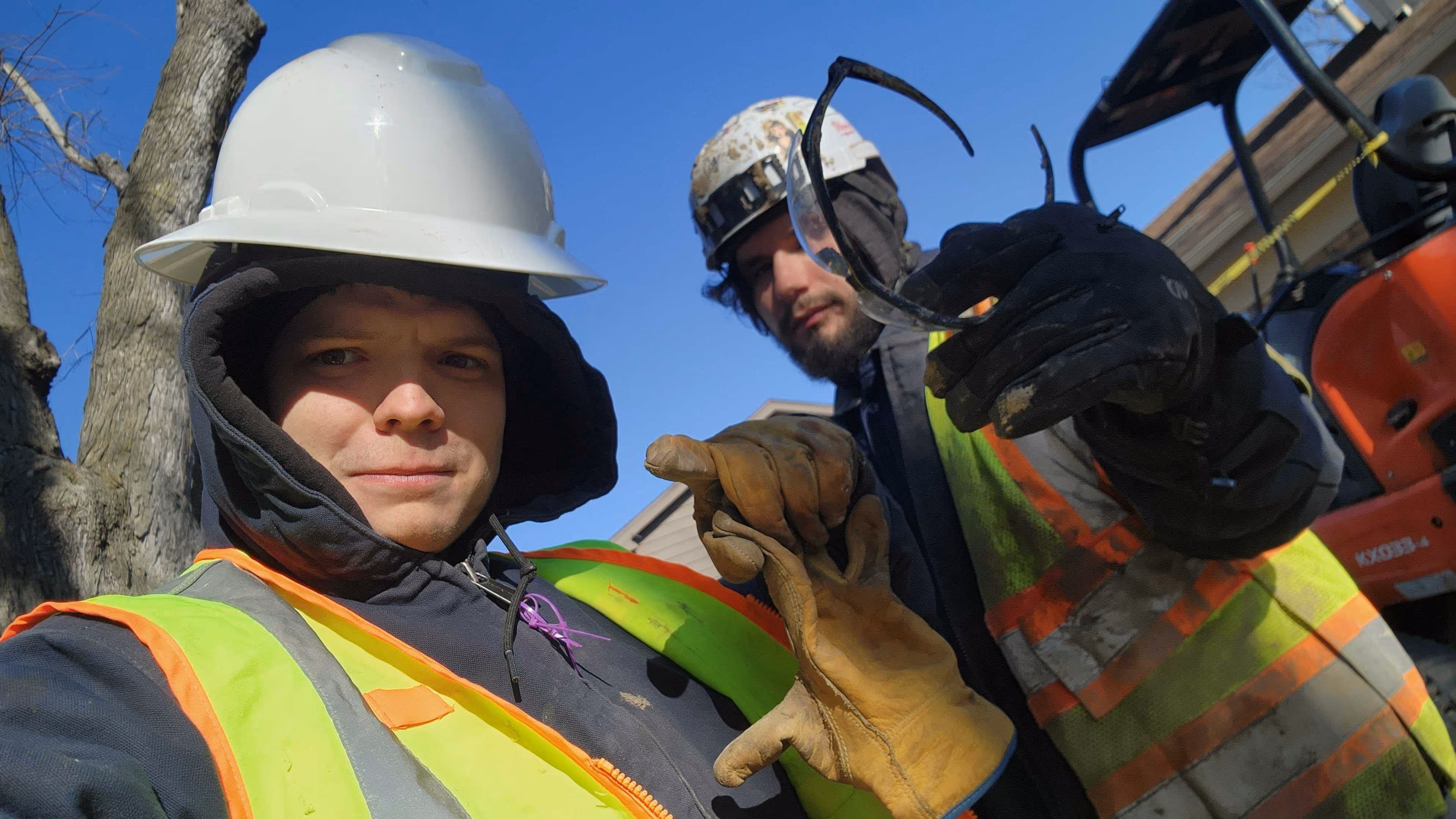 Omaha Drain crew excavating an outside sewer line in a front yard