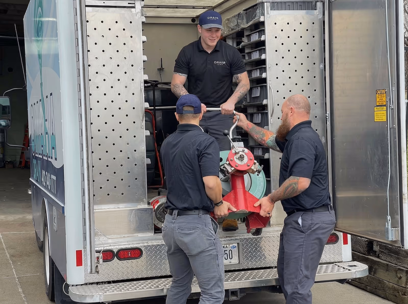Technician performing a camera inspection at a cleanout
