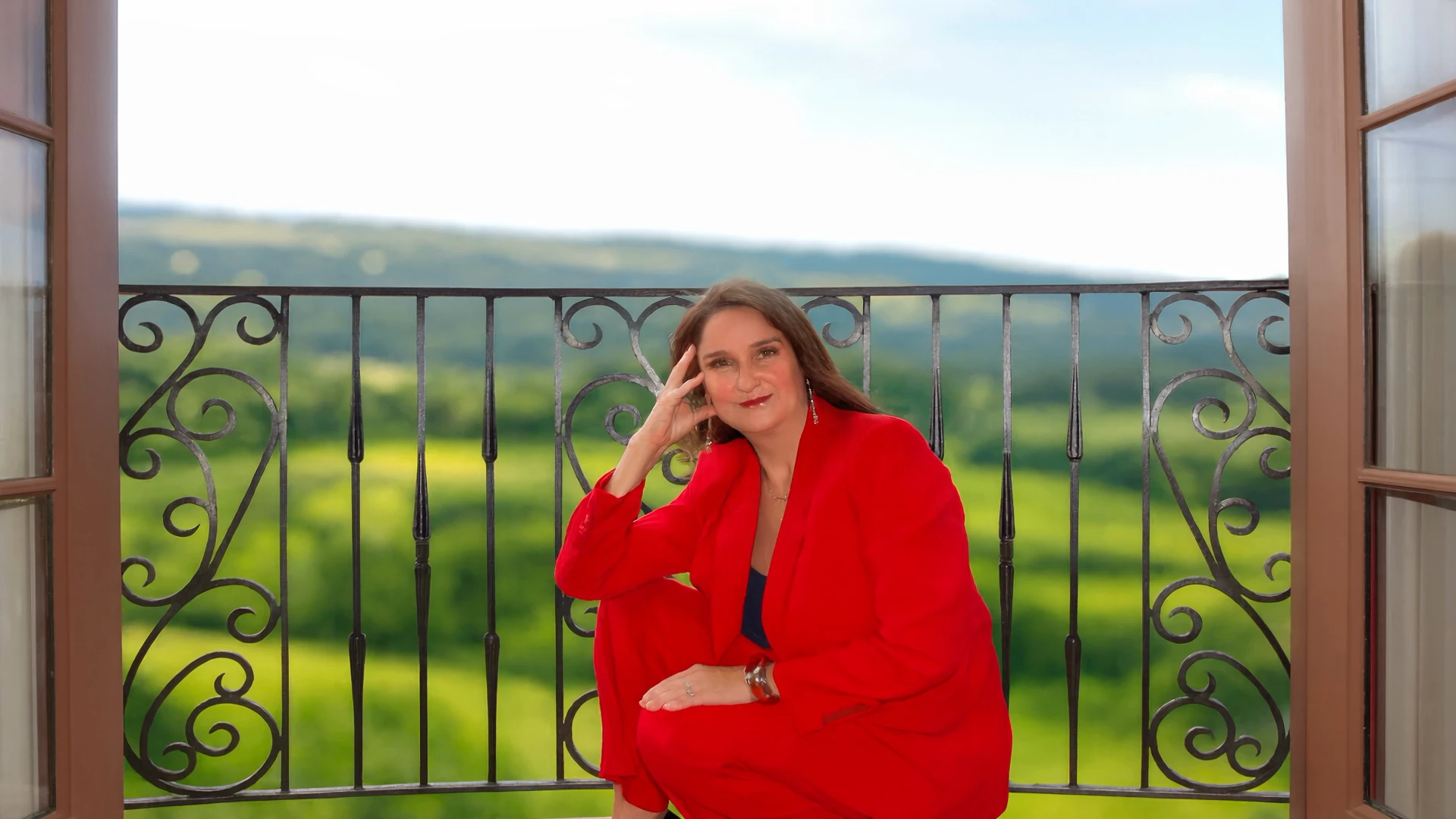 JL Carpenter, criminal defense attorney, on a balcony overlooking the hills