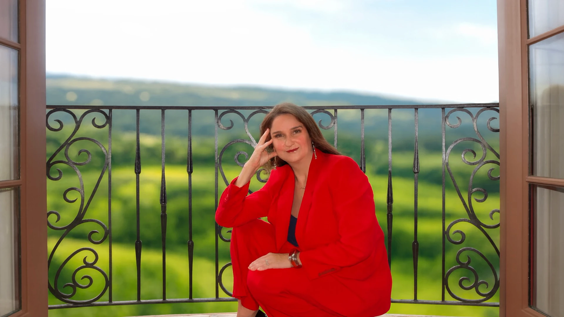 JL Carpenter, criminal defense attorney, on a balcony overlooking the hills