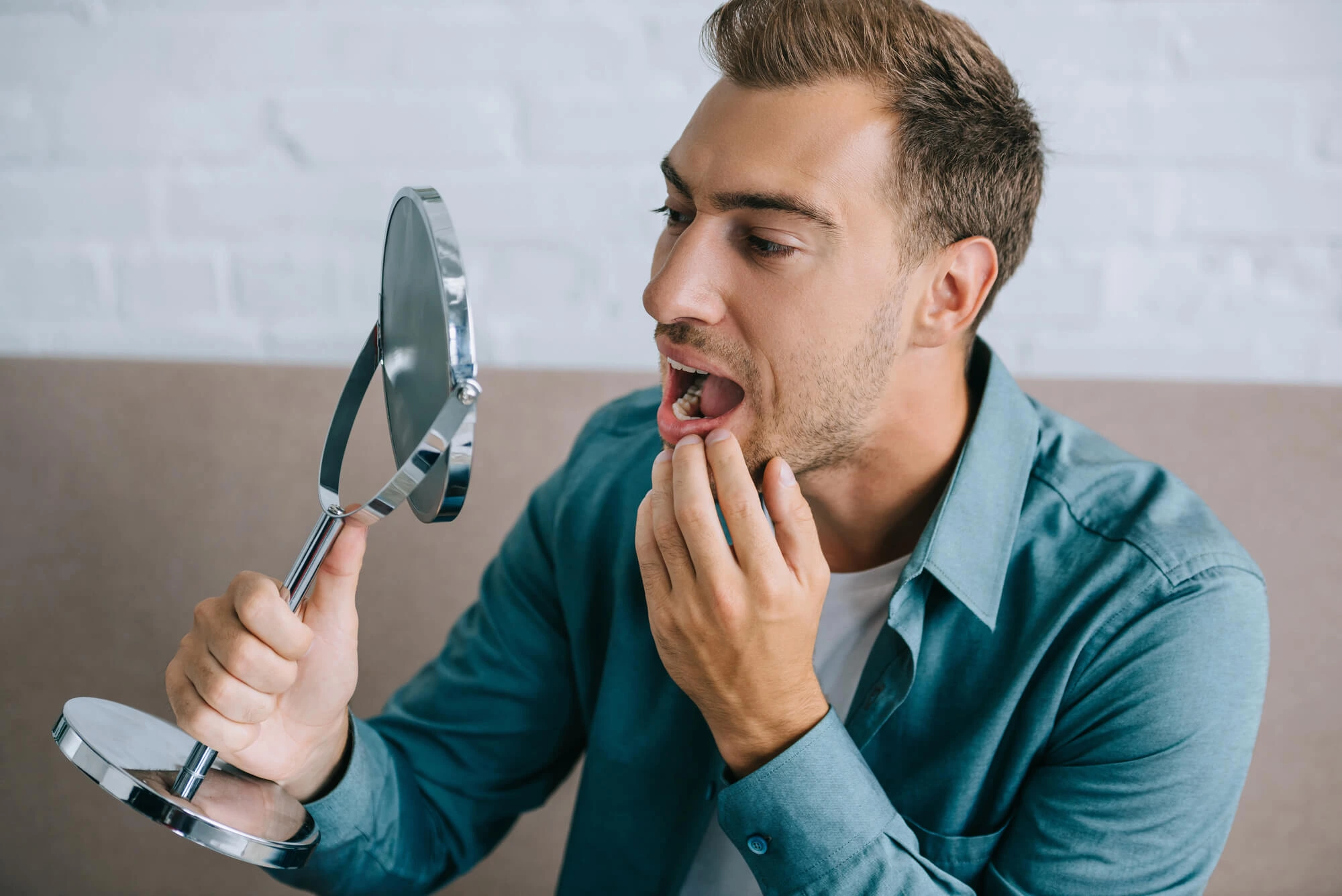 Man Needing to Visit the Emergency Dentist in Sumter SC