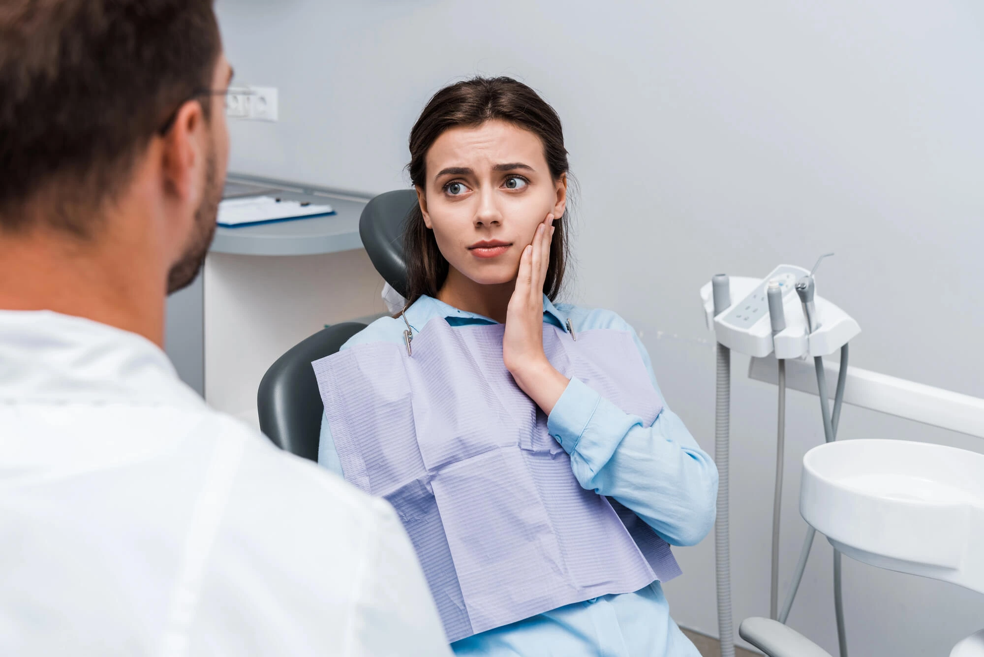 Woman with a Toothache Visiting the Emergency Dentist in Sumter SC