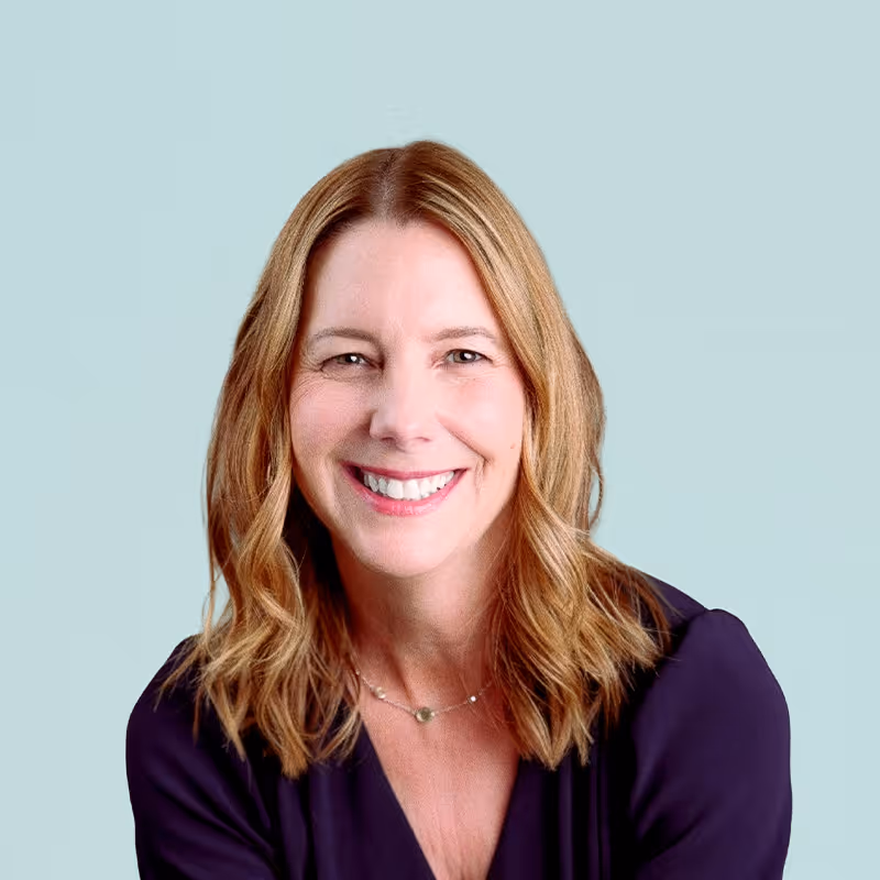 Portrait of Caryl Hilliard against a light background.