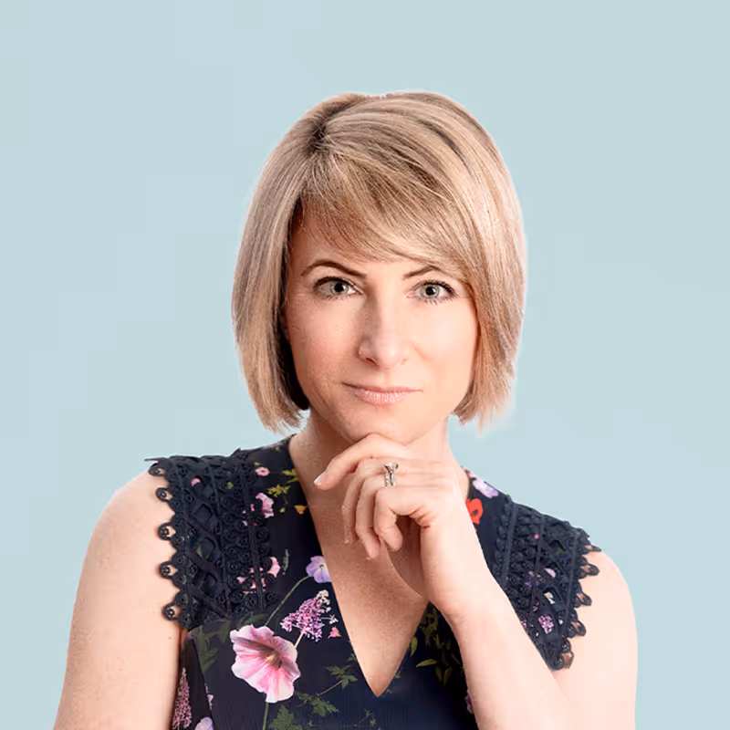 Portrait of Holly Petroff against a light background.