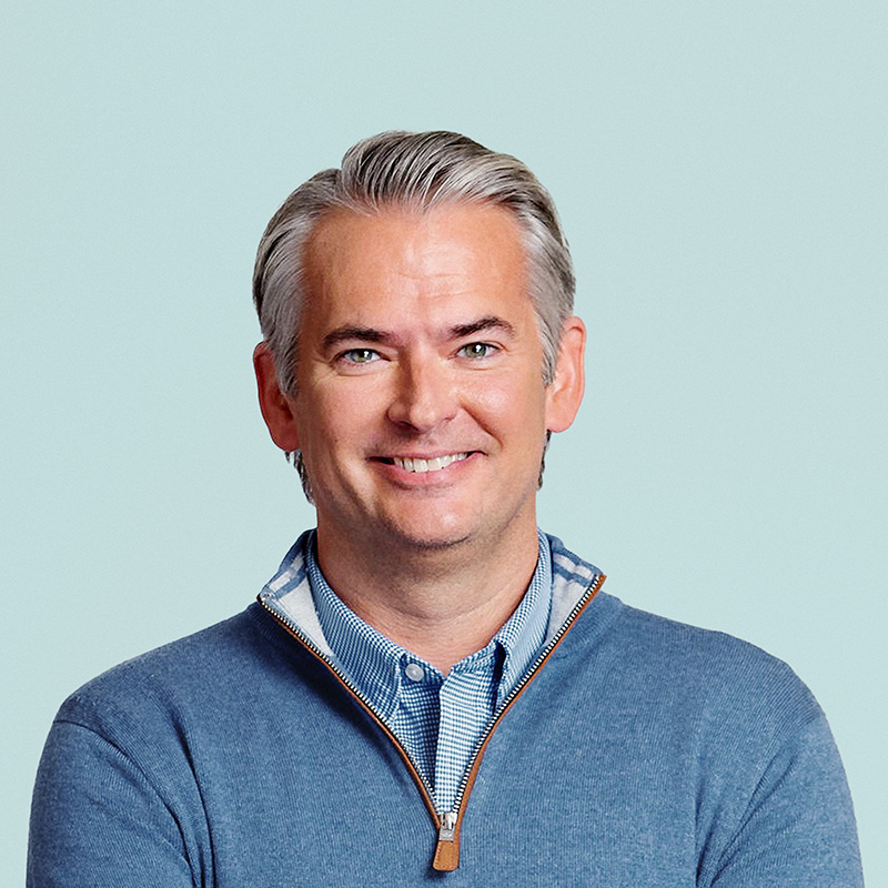 Portrait of Brian Doubles, President and CEO of Synchrony.