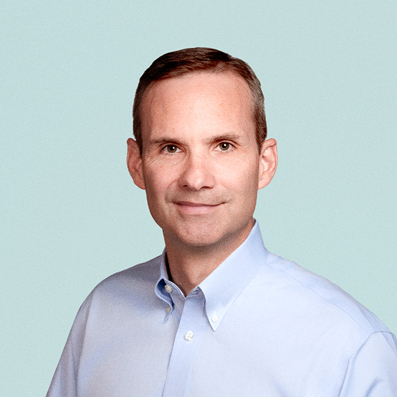 Portrait of Craig Cronheim against a light background.