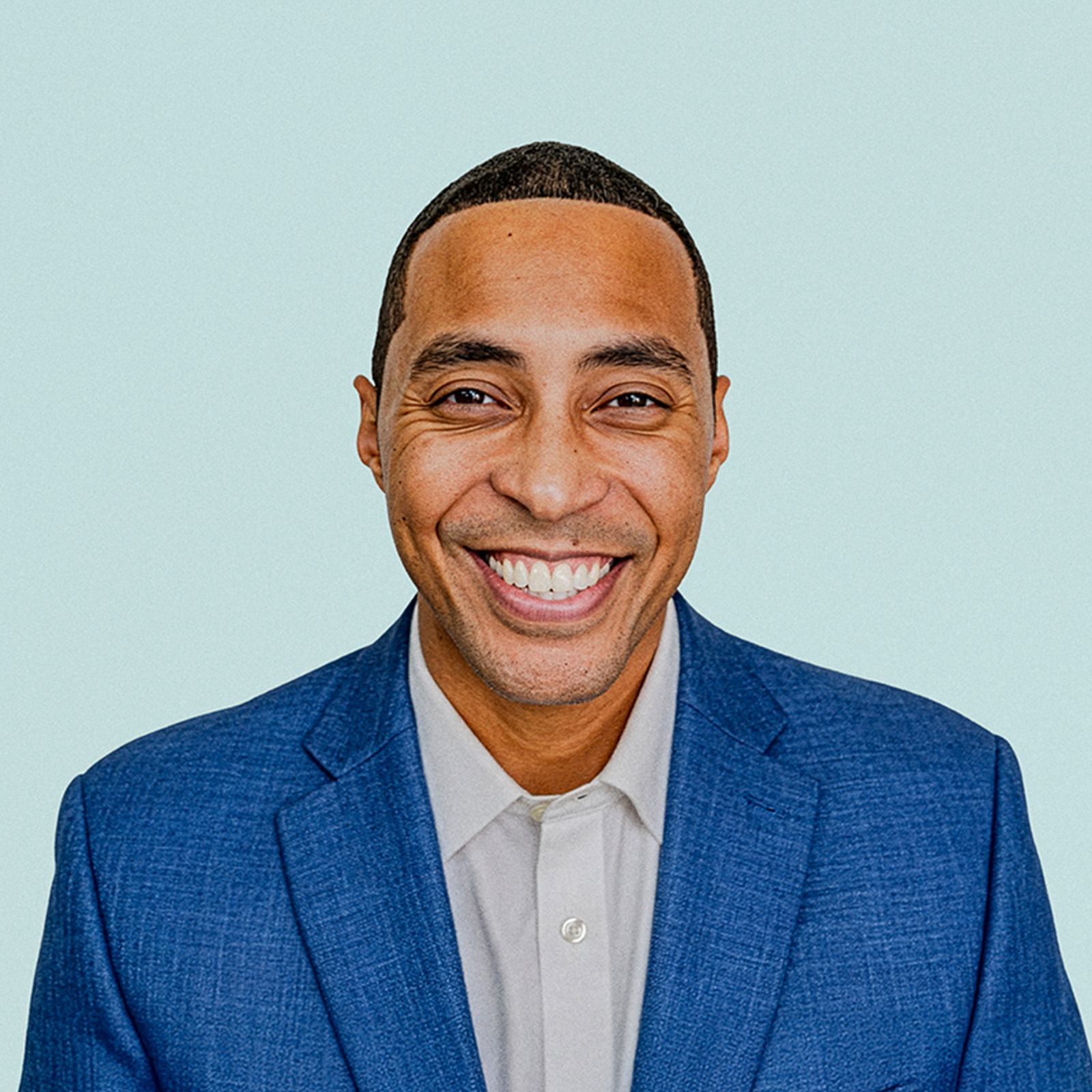 Portrait of Stacey Urry against a light background.