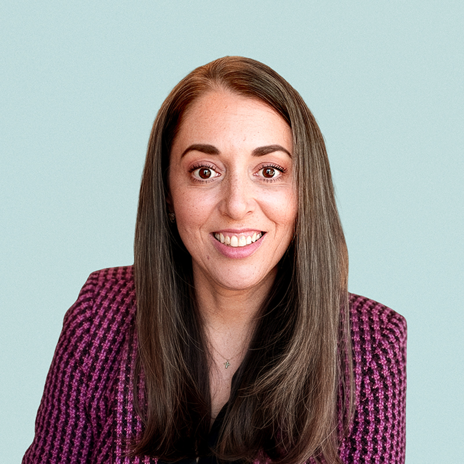 Portrait of Colleen Elkins against a light background.