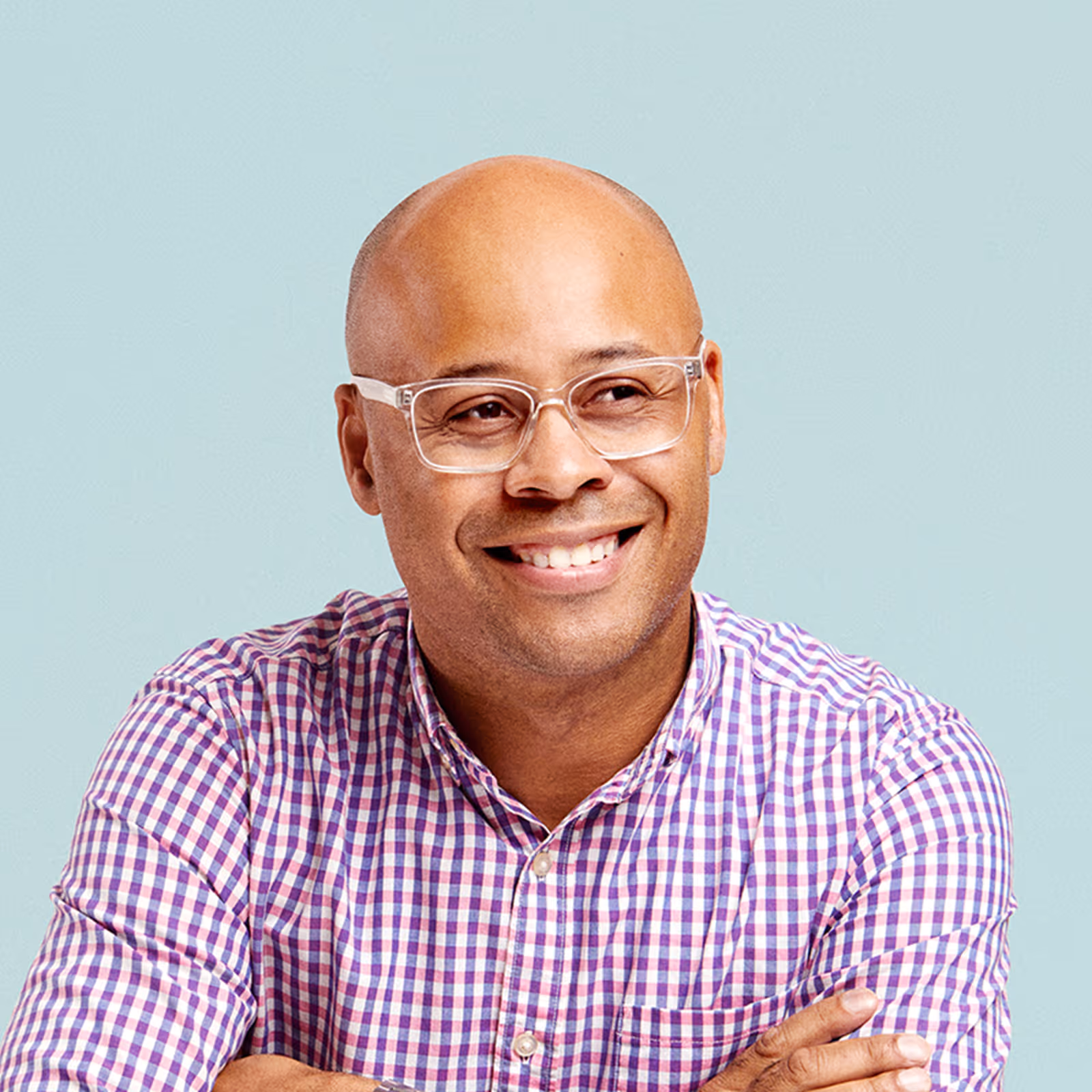 Portrait of Julian Lute against a light background.