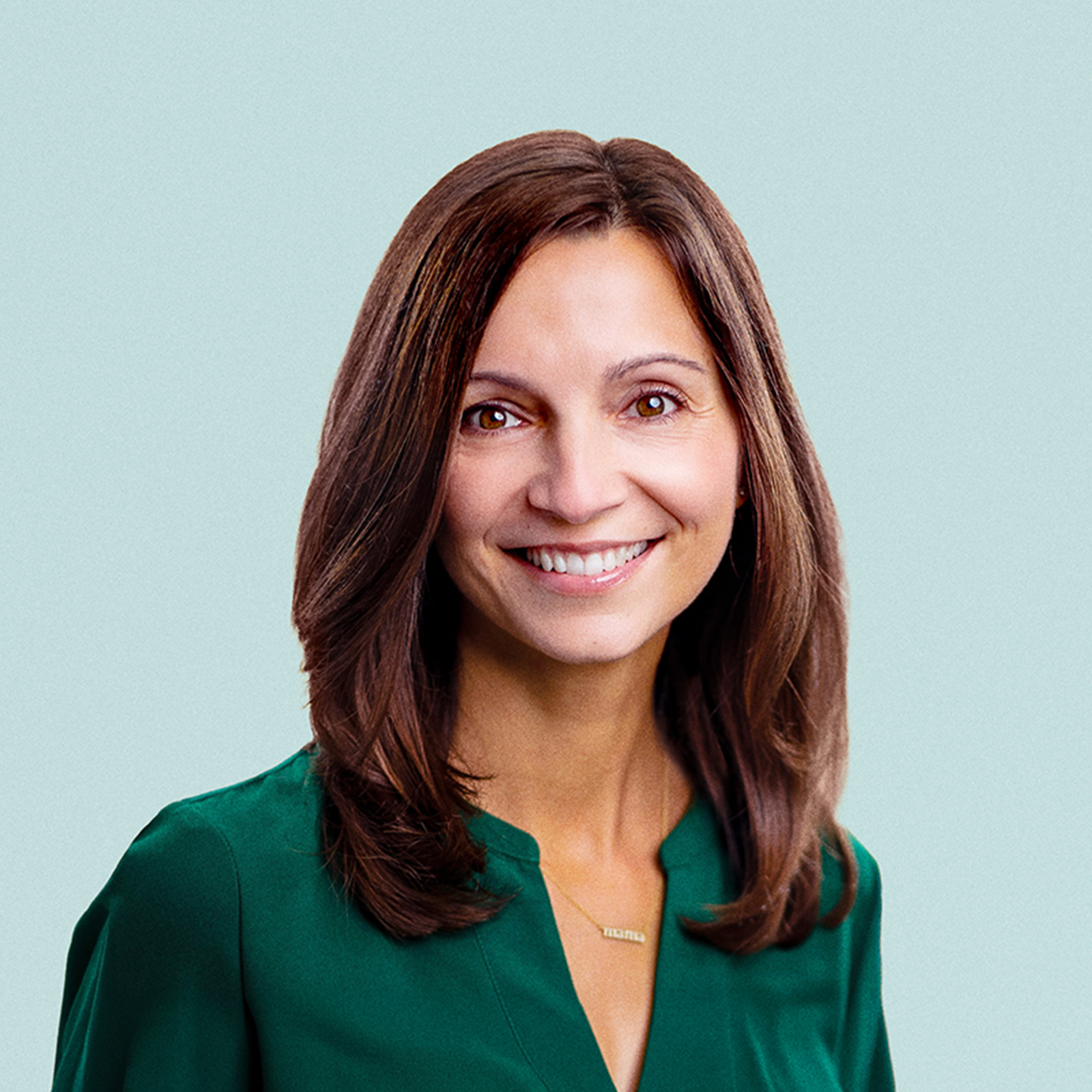 Portrait of Laura Fuentes against a light background.