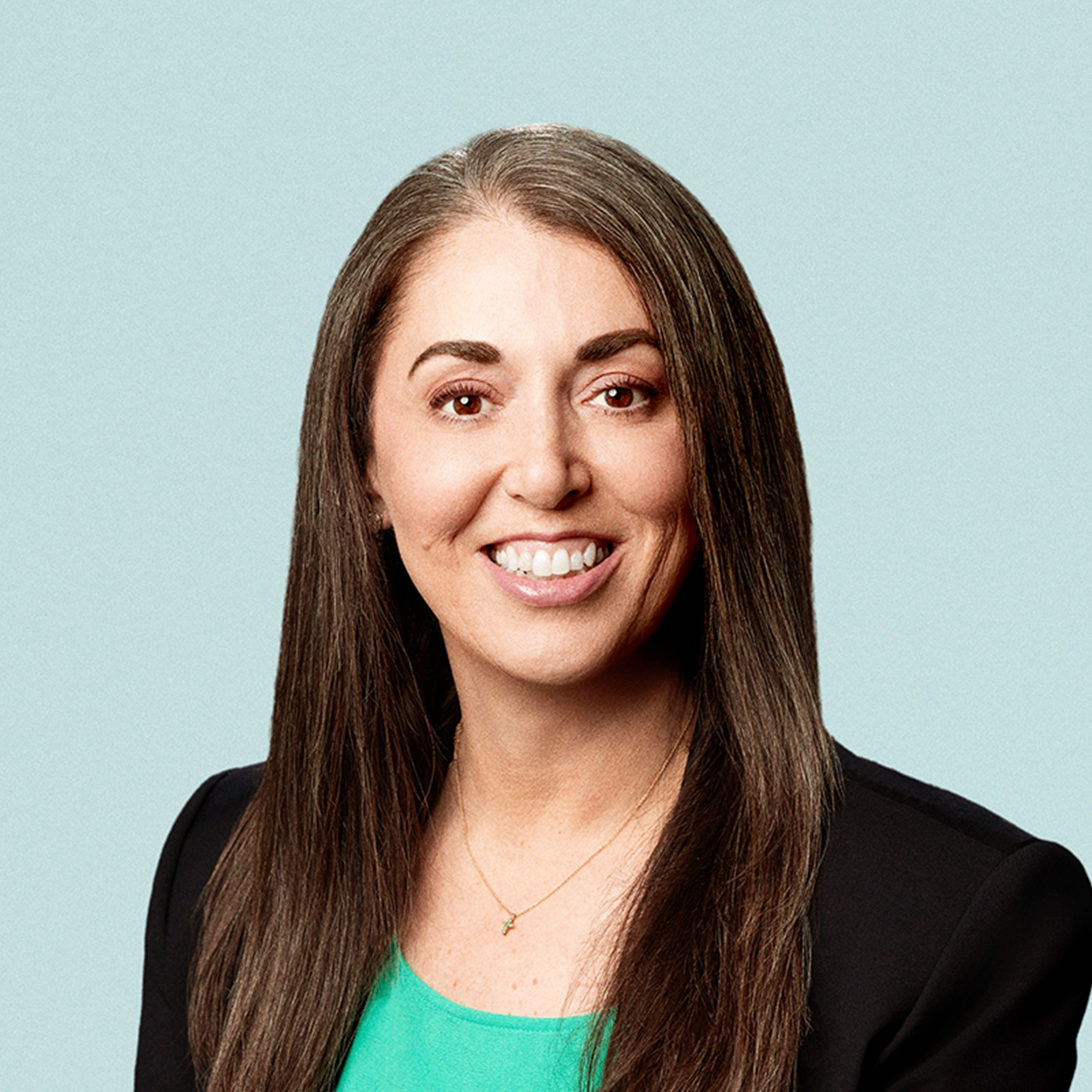 Portrait of Colleen Elkins against a light background.