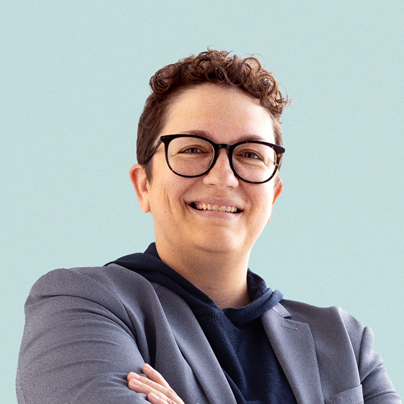 Portrait of Jen Engeling against a light background.
