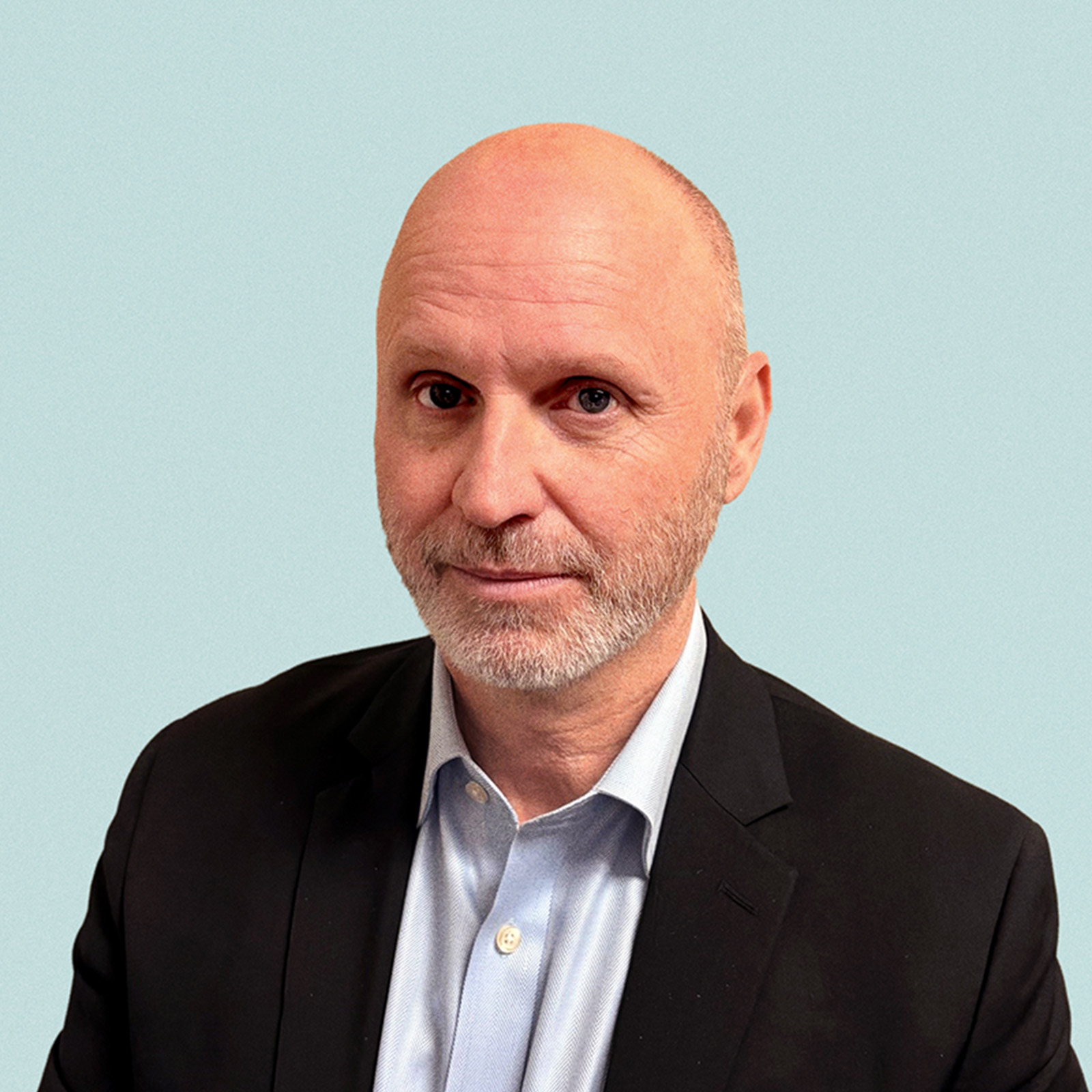 Portrait of Todd Klinglesmith against a light background.