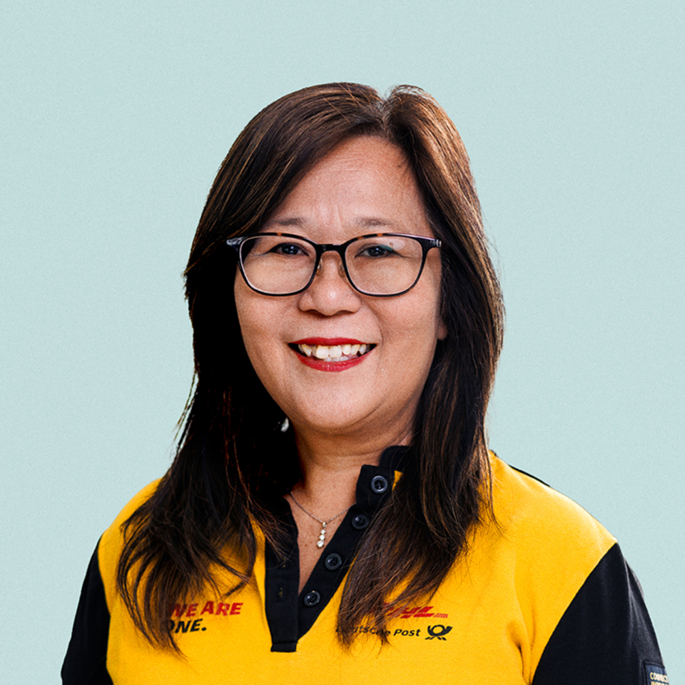 Portrait of Jen Morgan against a light background.