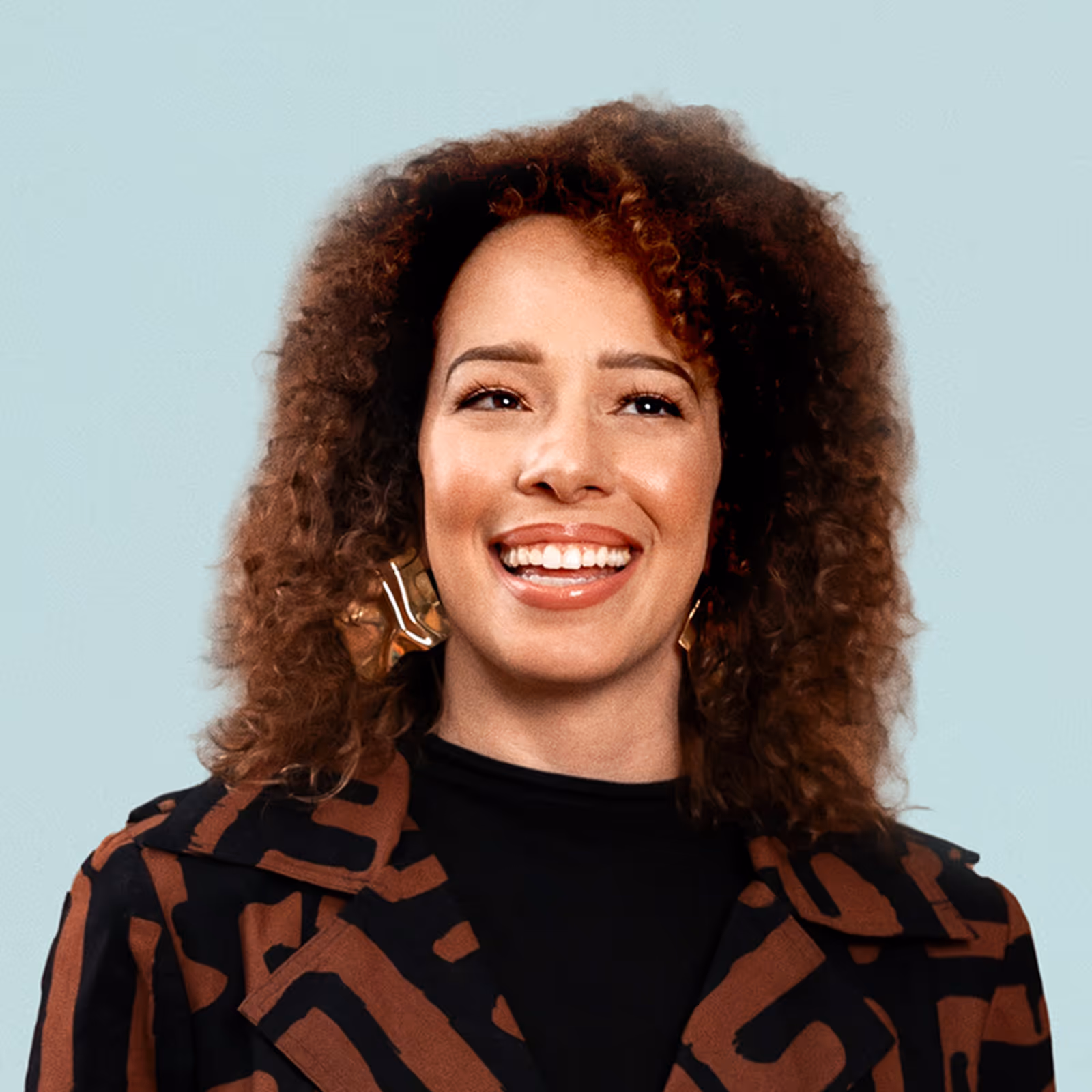 Portrait of Alexandra Legend Siegel against a light background.