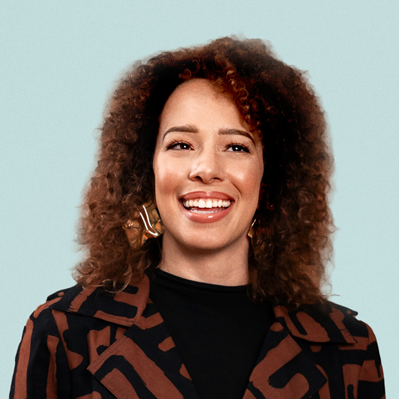 Portrait of Alexandra Legend Siegel against a light background.