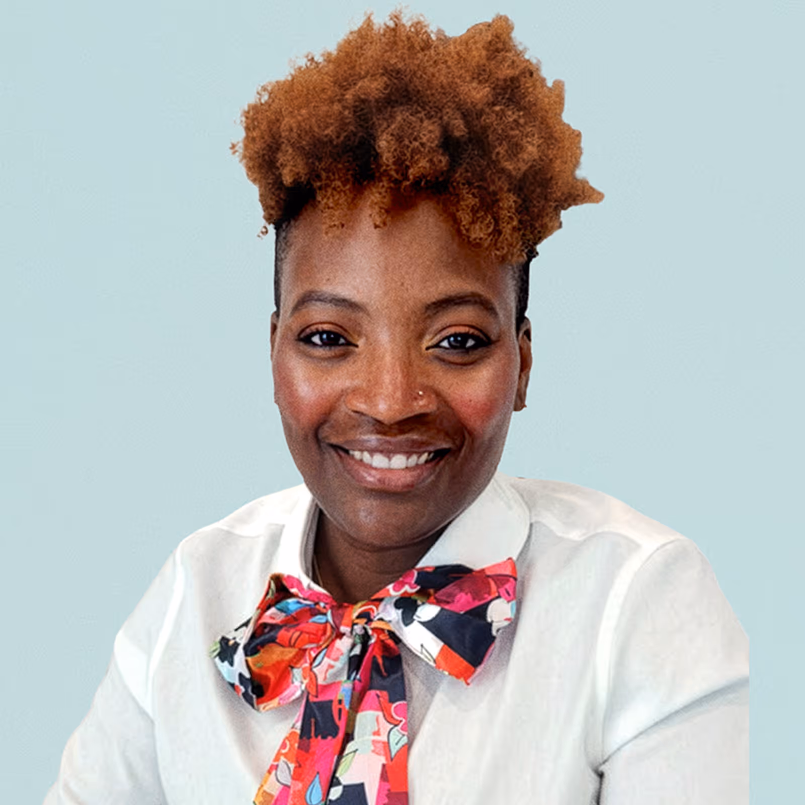 Portrait of Kiana Jordan against a light background.