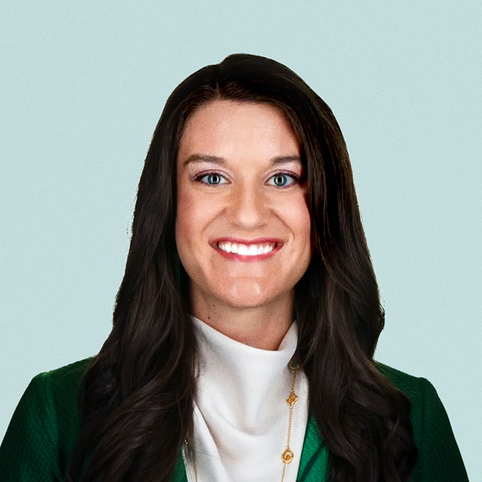 Portrait of Jill Larsen against a light background.