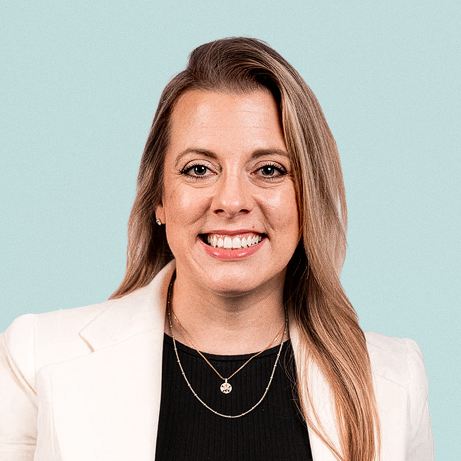 Portrait of Sarah Arguello against a light background.