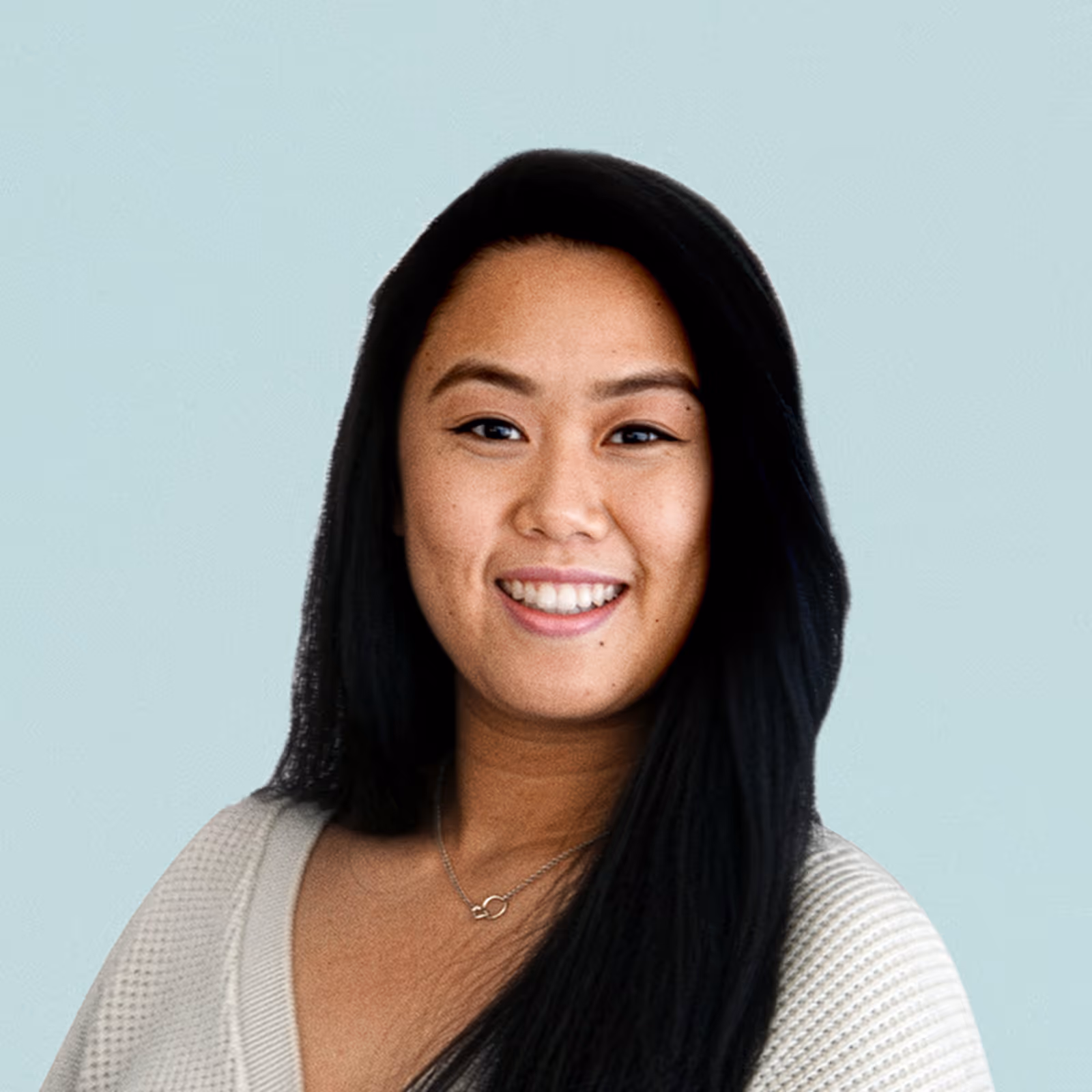 Portrait of Sarah Arguello against a light background.