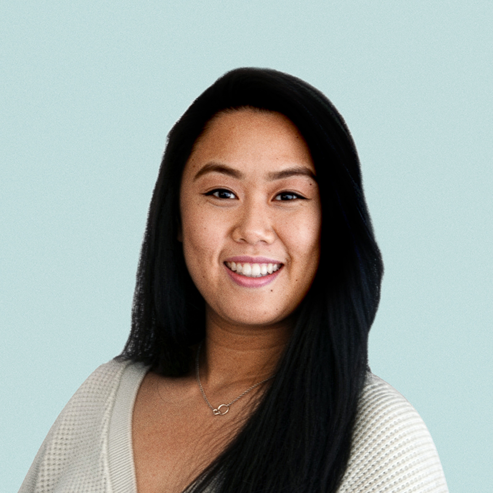 Portrait of Sarah Arguello against a light background.