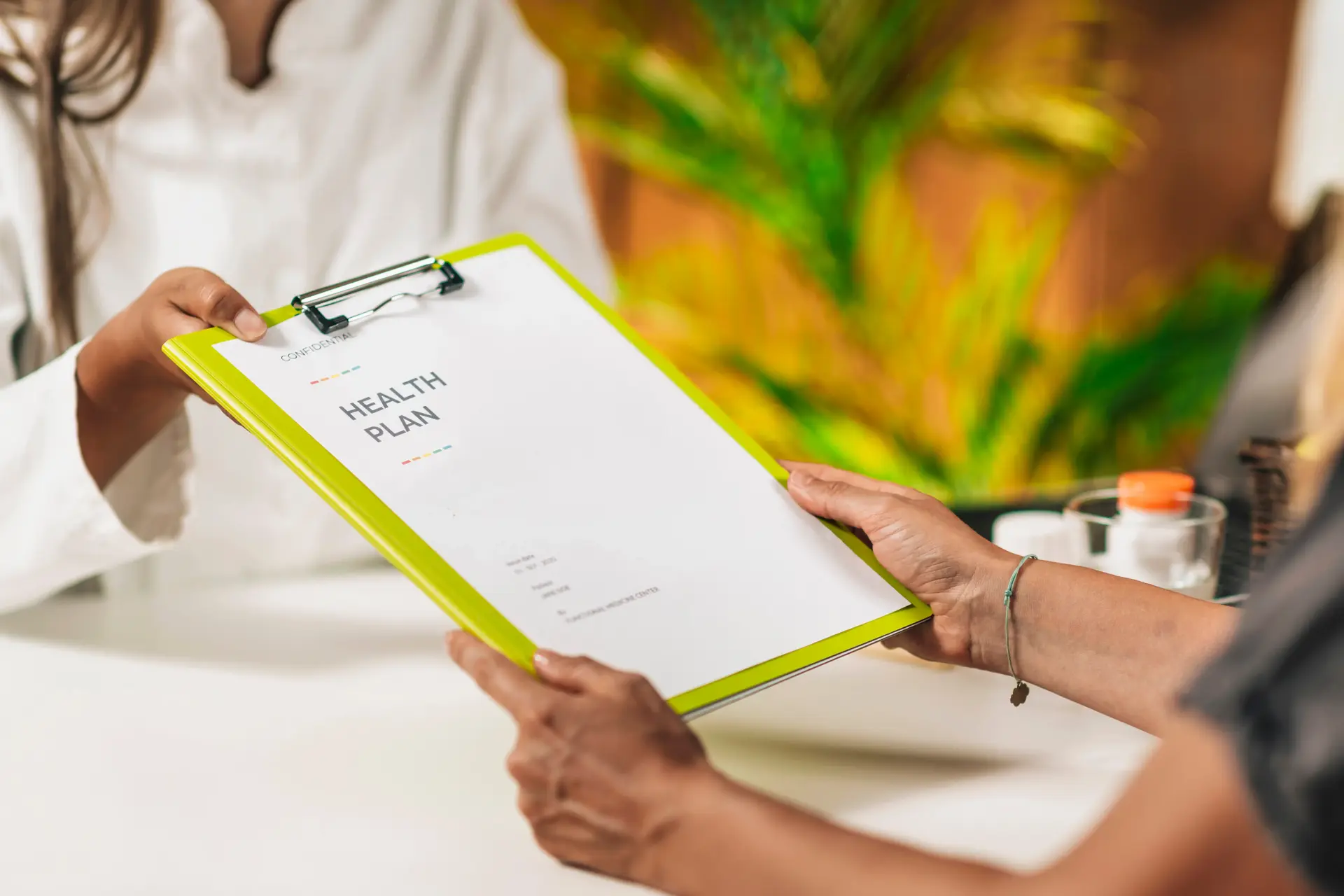 A doctor discussing a health plan with a patient.