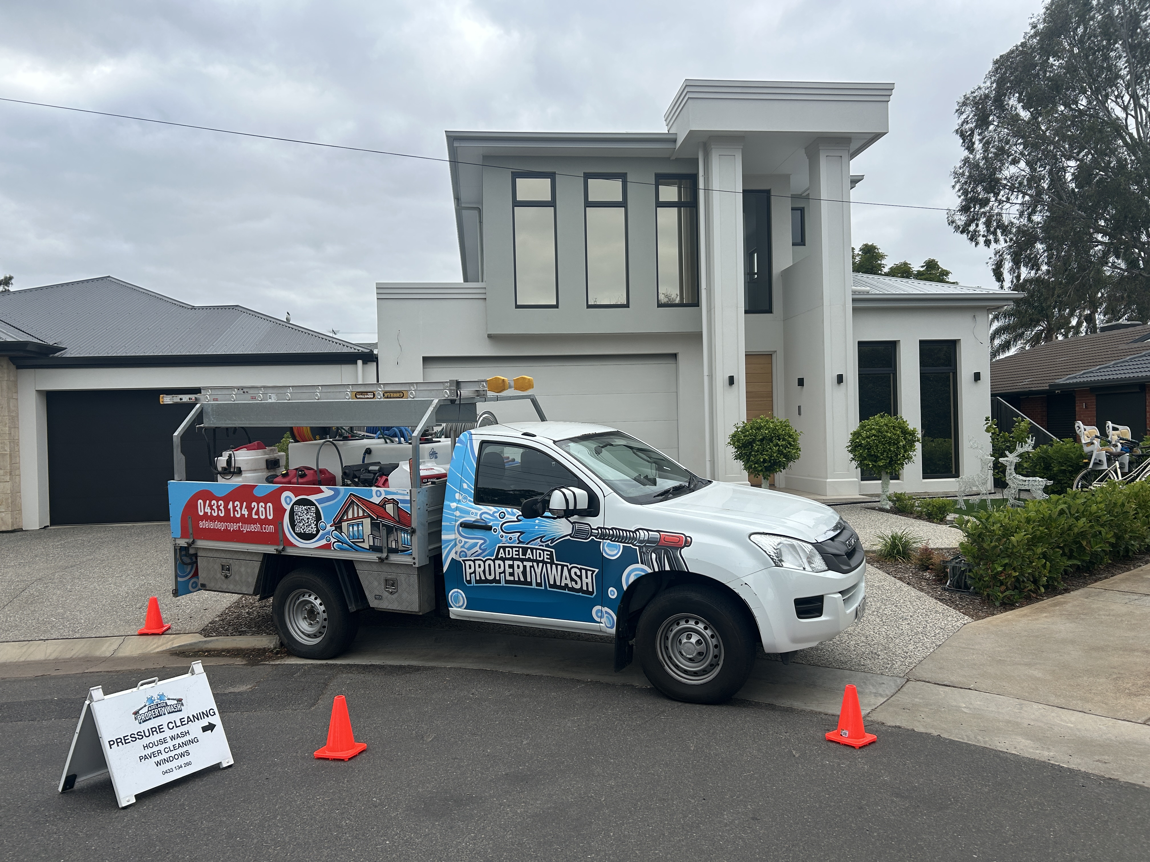 An Adelaide Property Wash Utility Vehicle on location for Window and Glass Cleaning