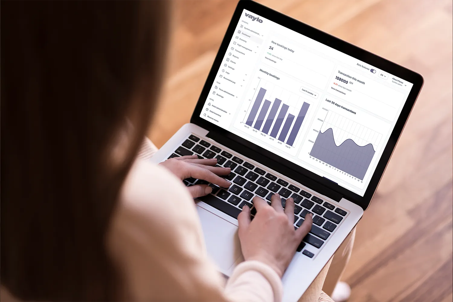 Woman holding laptop