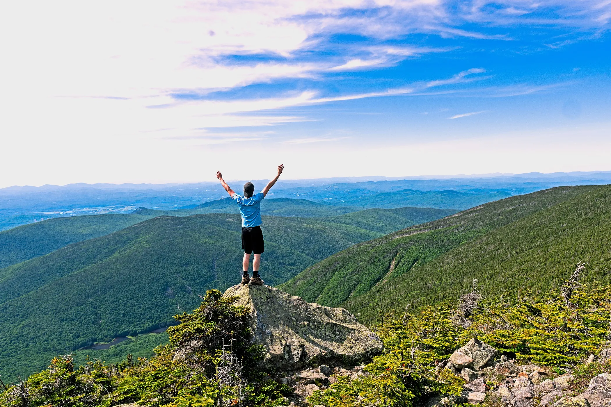 man in front of a nature view