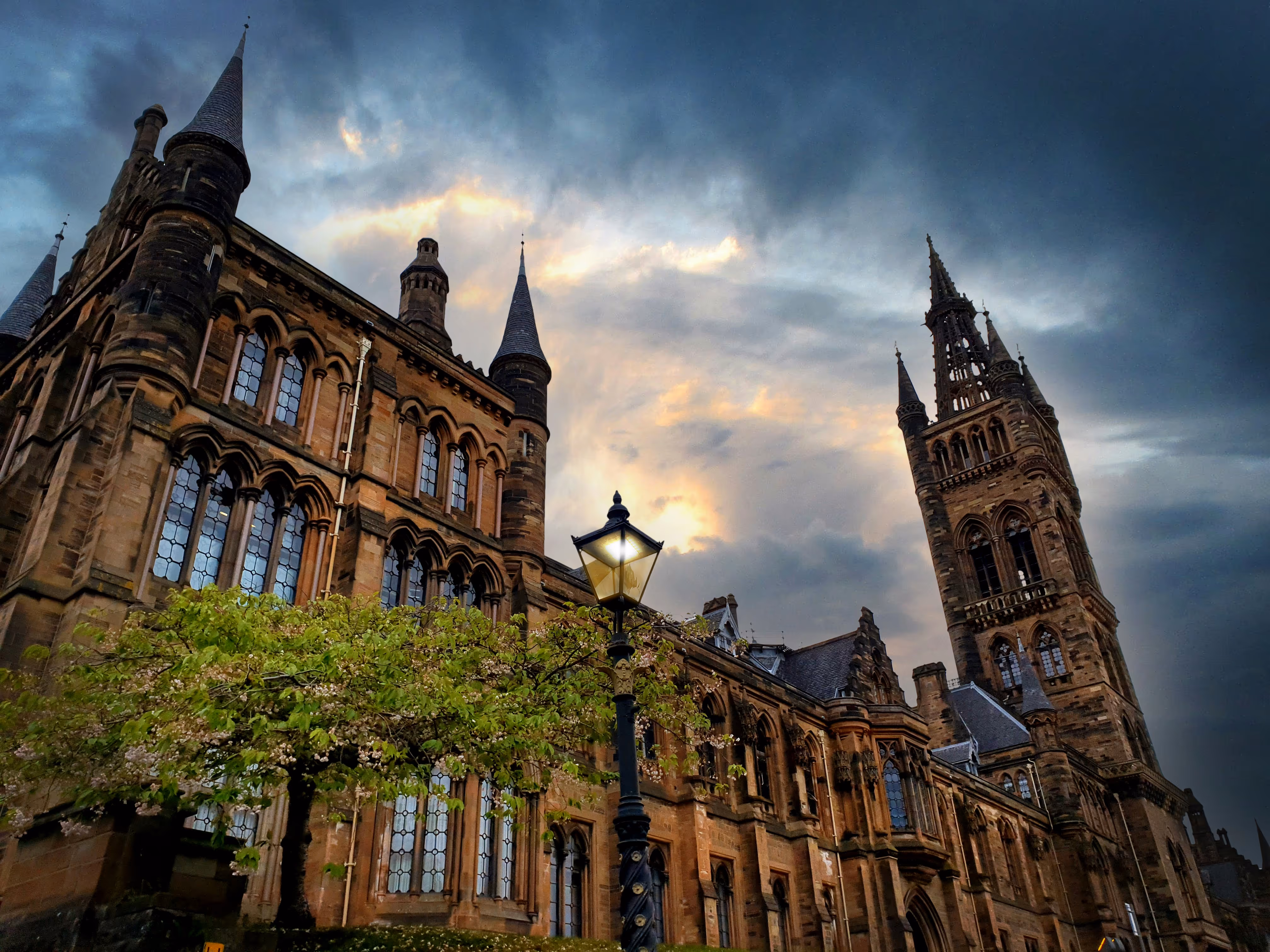 A picture of an older building with a clocktower