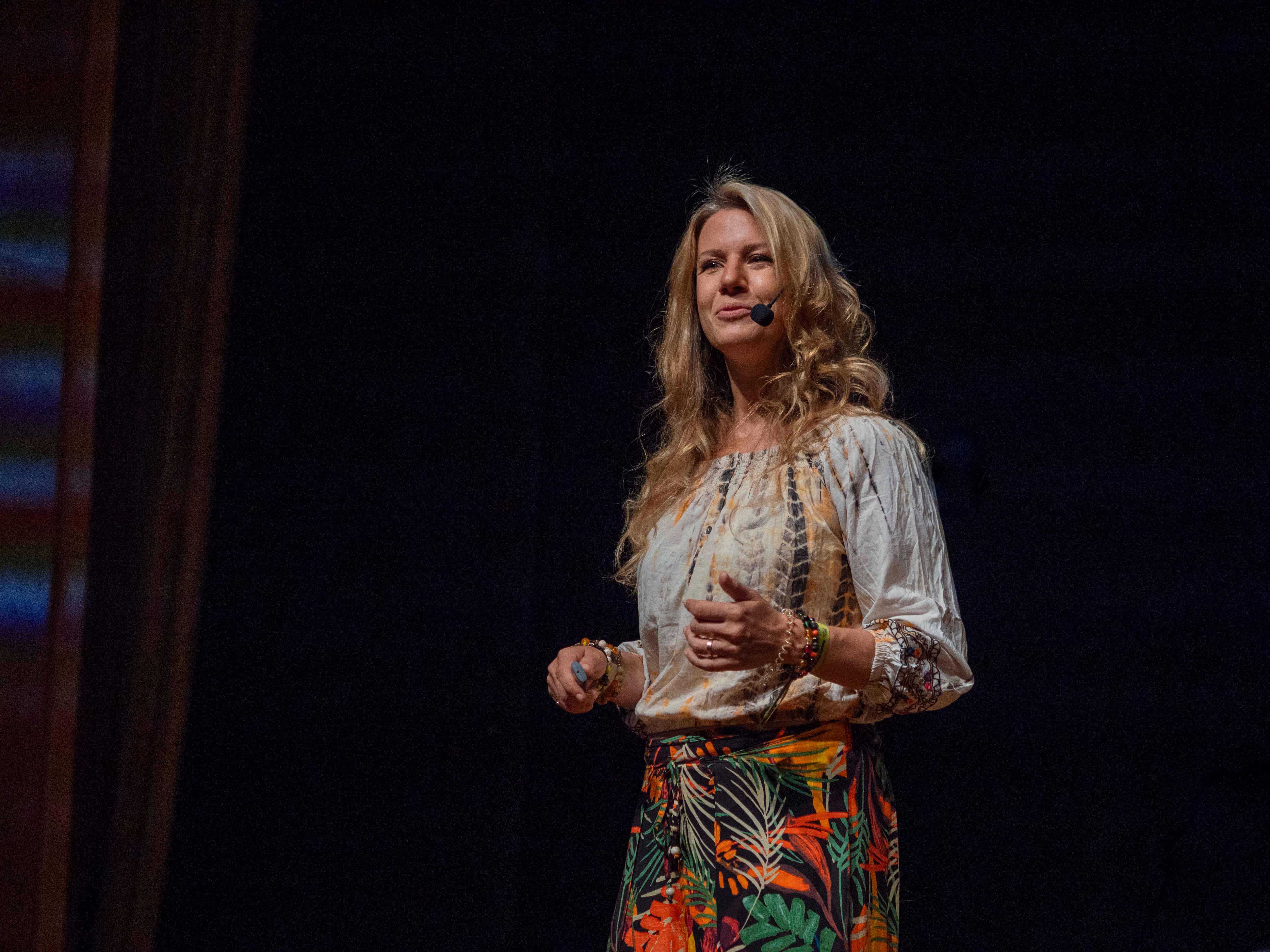 Ruth on stage as a speaker
