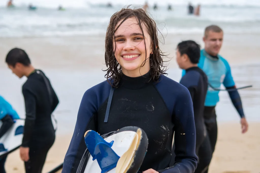 A student enjoying a group surfing activity in Sydney.