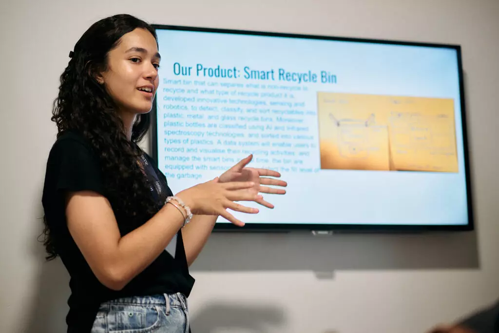 A student delivering a business management project