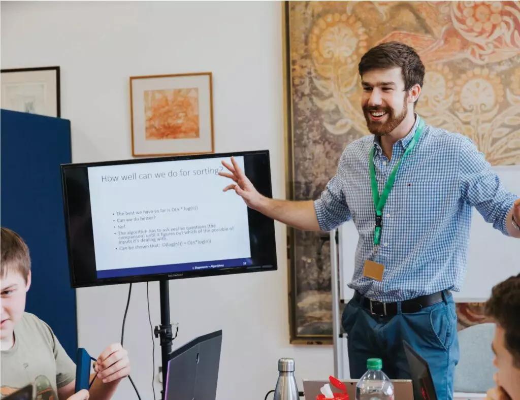 A tutor delivering a mathematics class
