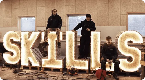 Image of the word SKILLS written with lights