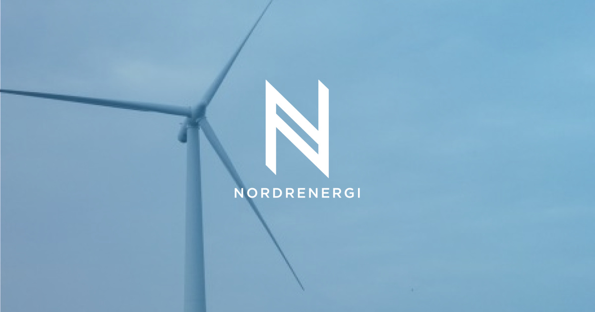 Offshore wind turbine at sea with the Nordrenergi logo