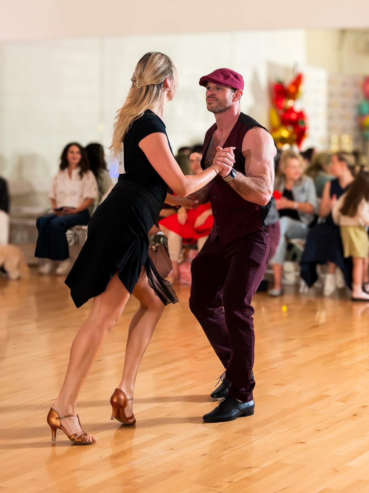 Adult couple dancing together in a studio during dance classes in Playa del Rey.