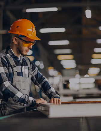A person working on a shop floor.