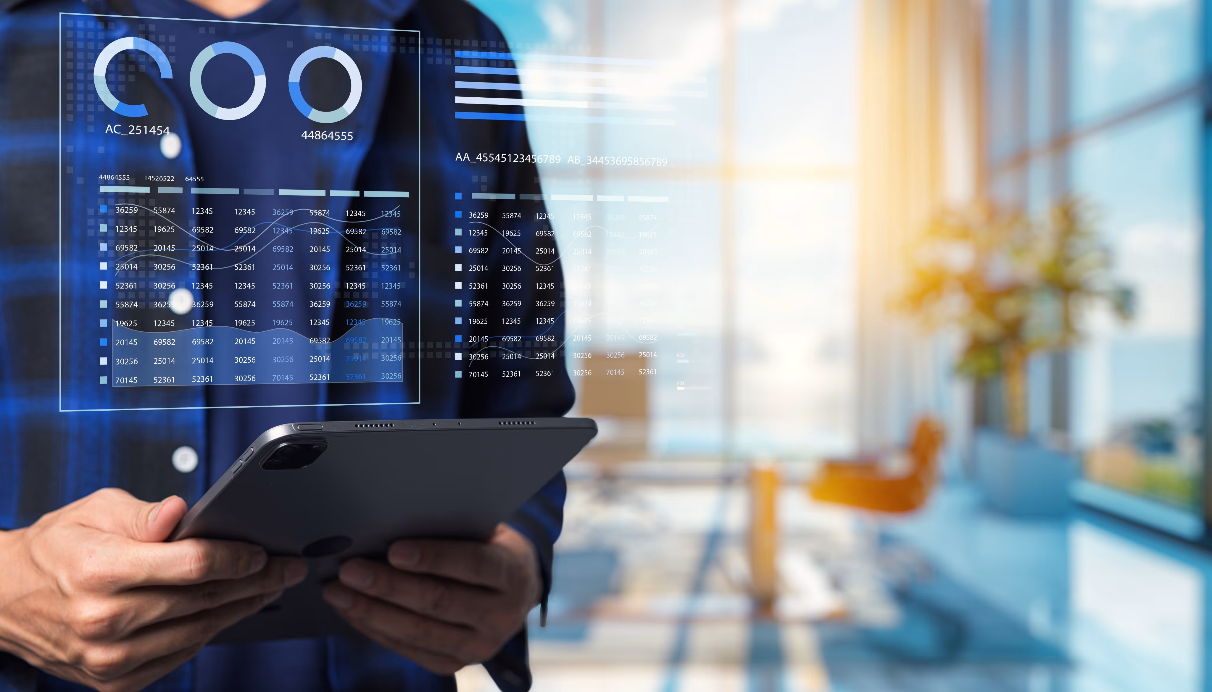 An ipad with data showing above it.