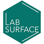 Lab Surface company logo with white text on a green hexagonal background.