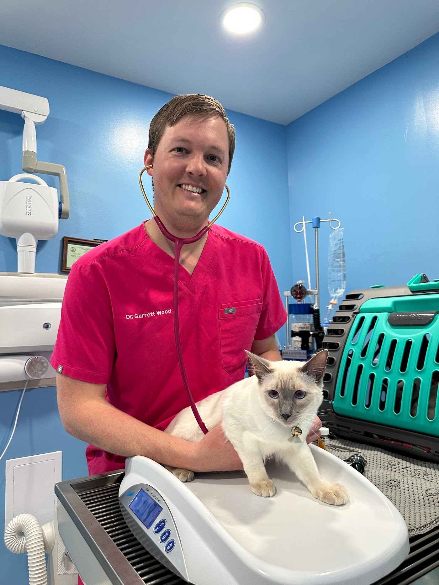 Dr. Garrett Wood with a patient